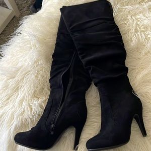 Black over the knee high heel boots